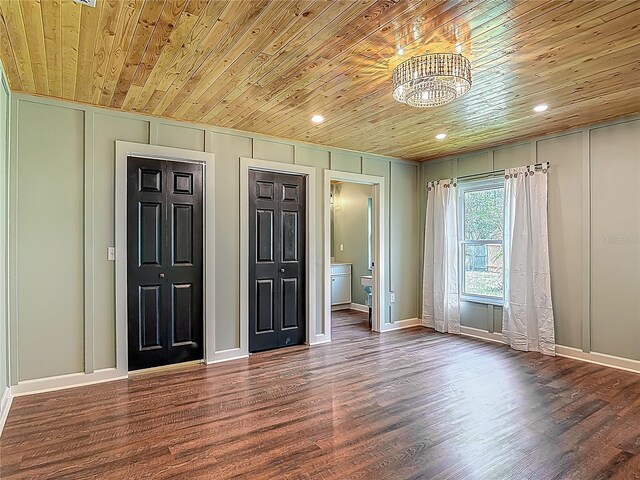 14 Zollinger Pl, Palm Coast, FL 32164 - unfurnished room featuring wooden ceiling, a decorative wall, wood finished floors, a chandelier, and recessed lighting