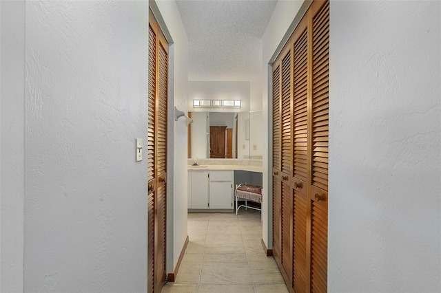 55 Village Cir, Palm Coast, FL 32164 - corridor featuring a textured ceiling