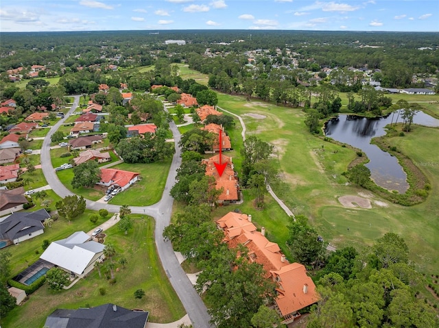 55 Village Cir, Palm Coast, FL 32164 - aerial view of property and surrounding area with a large body of water, nearby suburban area, and a golf club
