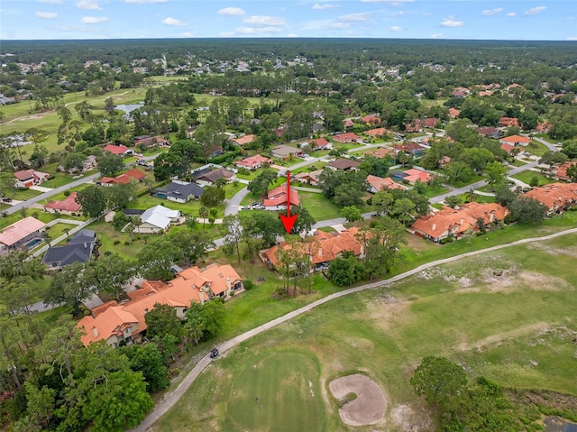 55 Village Cir, Palm Coast, FL 32164 - aerial overview of property's location featuring nearby suburban area, a local golf course, and a nearby body of water