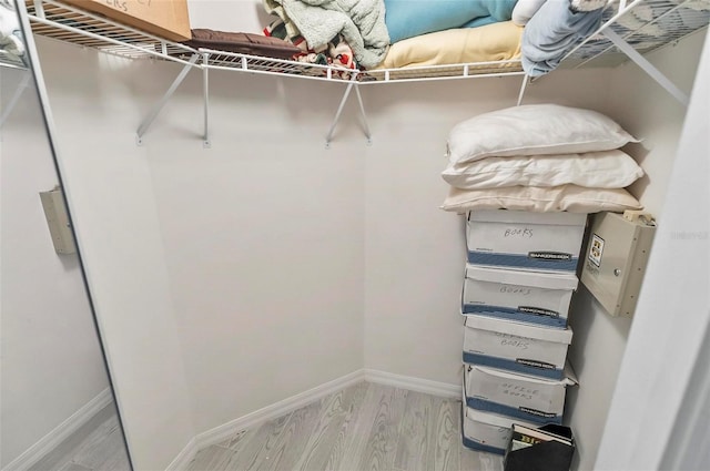 80 Flemingwood Ln, Palm Coast, FL 32137 - spacious closet featuring wood finished floors