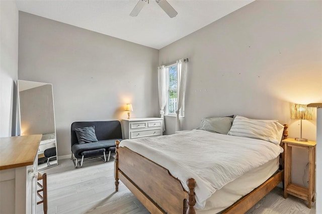 80 Flemingwood Ln, Palm Coast, FL 32137 - bedroom with light wood-style floors, a ceiling fan, and baseboards