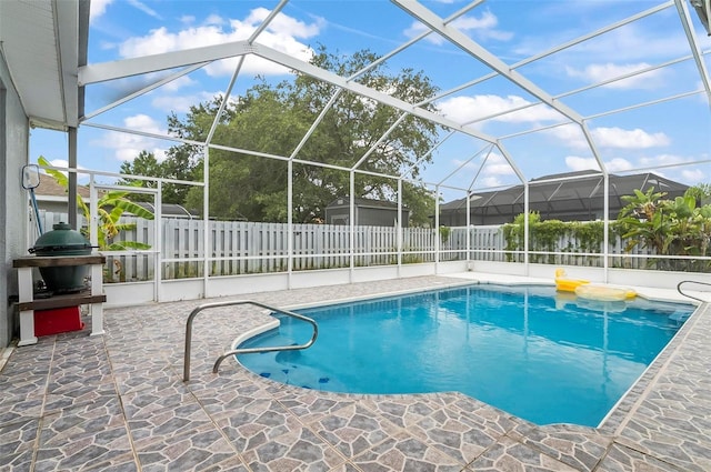 80 Flemingwood Ln, Palm Coast, FL 32137 - view of pool with a patio area, a fenced backyard, and a lanai