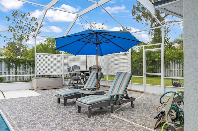 80 Flemingwood Ln, Palm Coast, FL 32137 - view of patio / terrace with a lanai