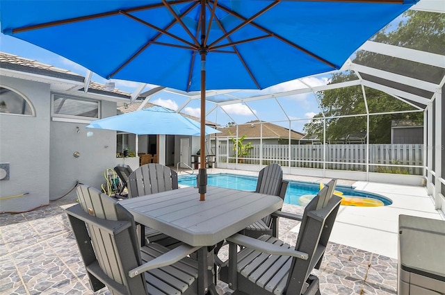 80 Flemingwood Ln, Palm Coast, FL 32137 - view of patio featuring a lanai and outdoor dining area
