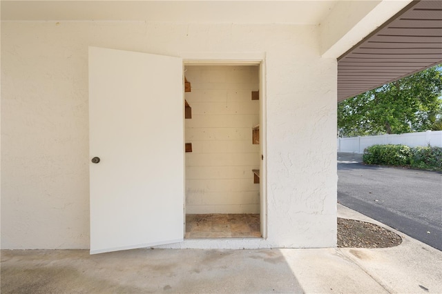 1 Tomoka Oaks Blvd Unit 135, Ormond Beach, FL 32174 - view of exterior entry with stucco siding