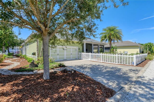 47 Hidden Treasure Dr, Palm Coast, FL 32137 - ranch-style house with driveway and a garage