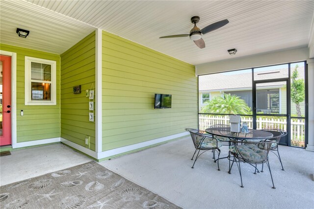 47 Hidden Treasure Dr, Palm Coast, FL 32137 - sunroom / solarium with ceiling fan, plenty of natural light, and outdoor dining area