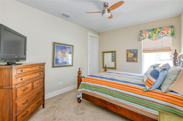 47 Hidden Treasure Dr, Palm Coast, FL 32137 - bedroom featuring light carpet, baseboards, and ceiling fan
