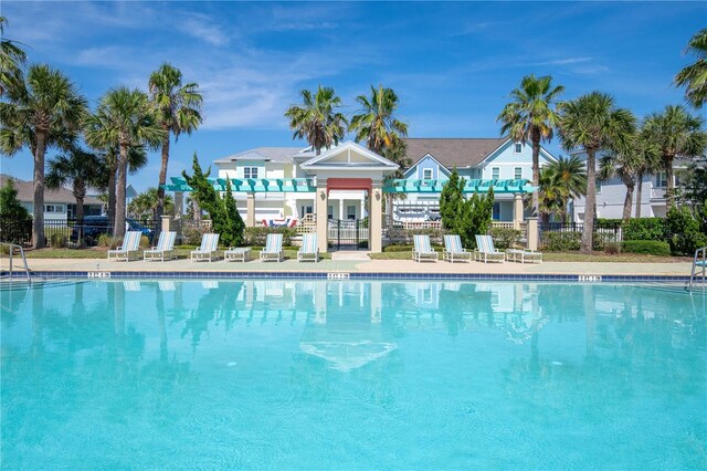 47 Hidden Treasure Dr, Palm Coast, FL 32137 - community pool featuring a pergola