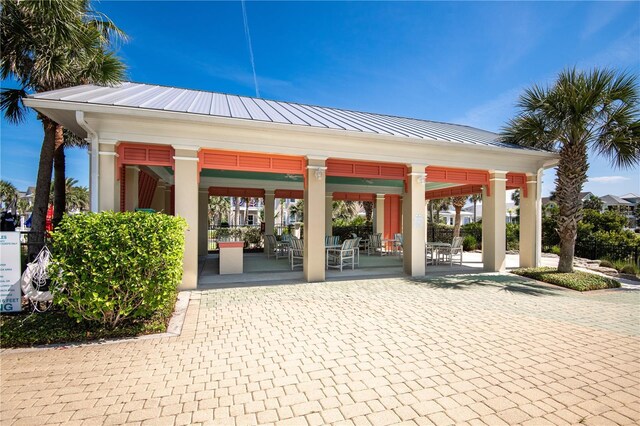 47 Hidden Treasure Dr, Palm Coast, FL 32137 - surrounding community featuring outdoor dining area and a gazebo