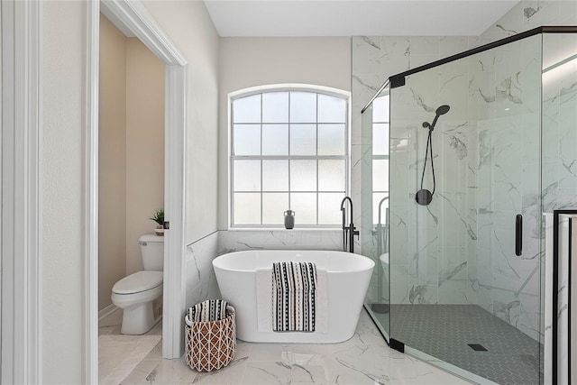 8 Zelda Ct, Palm Coast, FL 32164 - full bath featuring marble look tile flooring, a freestanding tub, a marble finish shower, and toilet