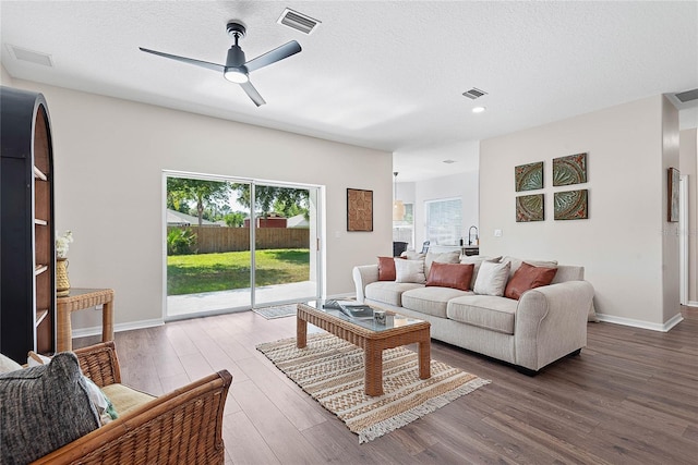 8 Zelda Ct, Palm Coast, FL 32164 - living area with wood finished floors, ceiling fan, baseboards, recessed lighting, and a textured ceiling