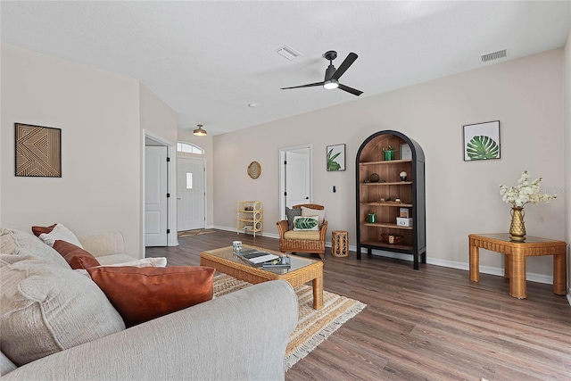 8 Zelda Ct, Palm Coast, FL 32164 - living area featuring wood finished floors, ceiling fan, and baseboards