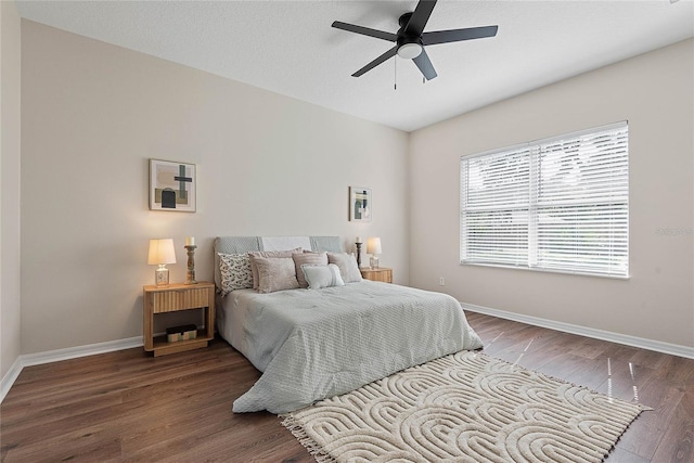 8 Zelda Ct, Palm Coast, FL 32164 - bedroom with baseboards, wood finished floors, and ceiling fan