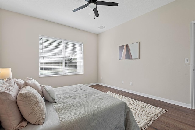 8 Zelda Ct, Palm Coast, FL 32164 - bedroom featuring dark wood-style floors, baseboards, and ceiling fan