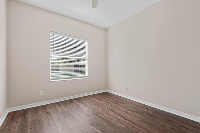 8 Zelda Ct, Palm Coast, FL 32164 - unfurnished room with wood finished floors, baseboards, and ceiling fan