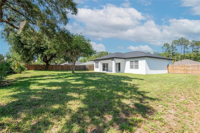 8 Zelda Ct, Palm Coast, FL 32164 - rear view of property with stucco siding