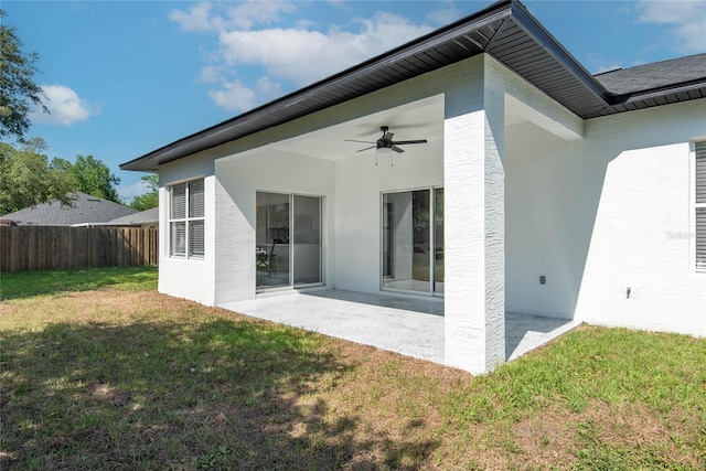 8 Zelda Ct, Palm Coast, FL 32164 - back of house with ceiling fan, a patio, and stucco siding