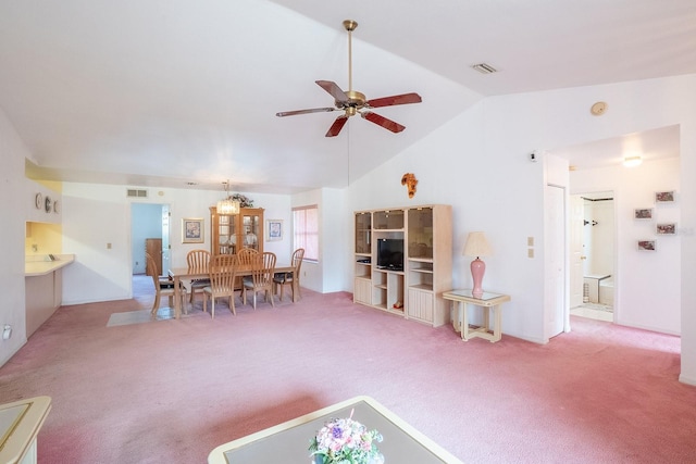 13 Point Of Woods Dr, Palm Coast, FL 32164 - carpeted living area with vaulted ceiling and ceiling fan