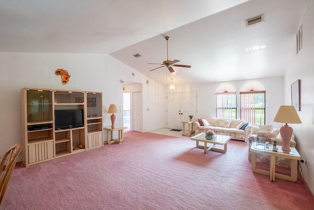 13 Point Of Woods Dr, Palm Coast, FL 32164 - carpeted living room with healthy amount of natural light, vaulted ceiling, and a ceiling fan