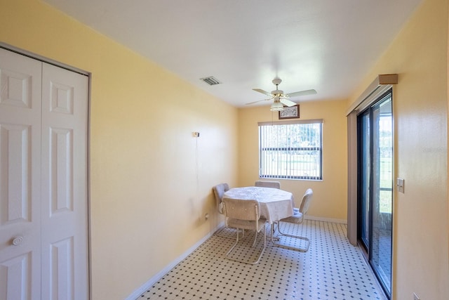 13 Point Of Woods Dr, Palm Coast, FL 32164 - dining space with baseboards and ceiling fan