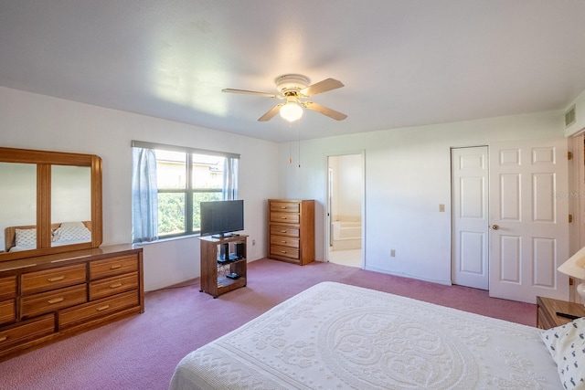 13 Point Of Woods Dr, Palm Coast, FL 32164 - carpeted bedroom featuring ensuite bath and a ceiling fan