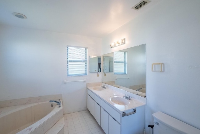 13 Point Of Woods Dr, Palm Coast, FL 32164 - full bath featuring a bath, toilet, double vanity, and tile patterned flooring