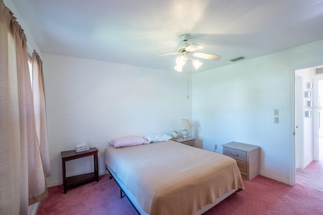 13 Point Of Woods Dr, Palm Coast, FL 32164 - carpeted bedroom with ceiling fan and baseboards