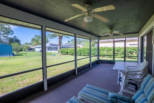 13 Point Of Woods Dr, Palm Coast, FL 32164 - sunroom featuring ceiling fan