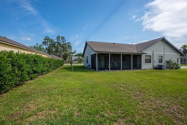 13 Point Of Woods Dr, Palm Coast, FL 32164 - view of green lawn with a sunroom and cooling unit