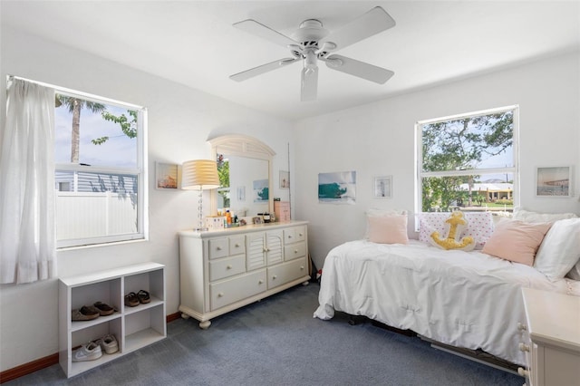 168 Palmetto Ave, Flagler Beach, FL 32136 - bedroom with carpet and a ceiling fan