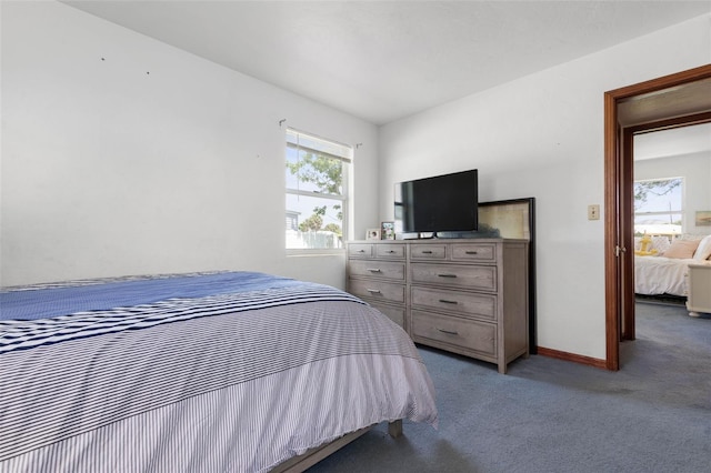 168 Palmetto Ave, Flagler Beach, FL 32136 - bedroom featuring carpet flooring and baseboards