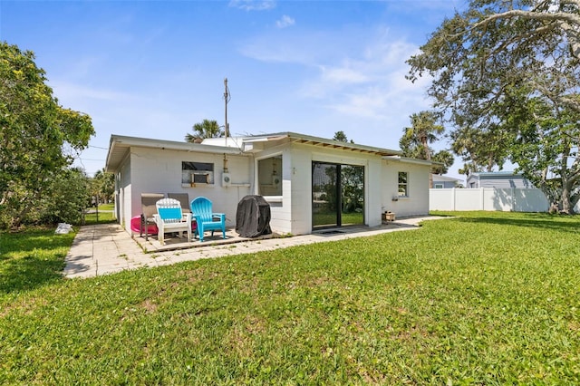 168 Palmetto Ave, Flagler Beach, FL 32136 - back of property with a patio area