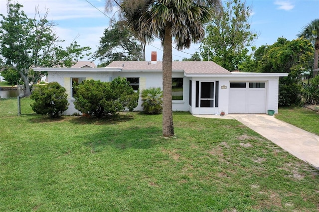 168 Palmetto Ave, Flagler Beach, FL 32136 - mid-century inspired home with driveway and an attached garage