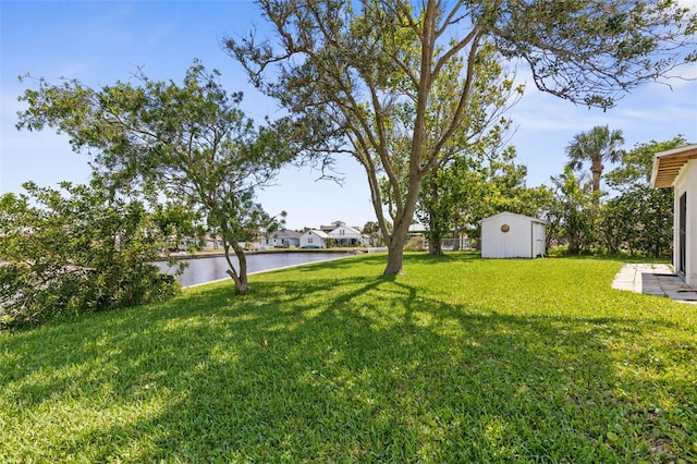 168 Palmetto Ave, Flagler Beach, FL 32136 - view of green lawn with a water view