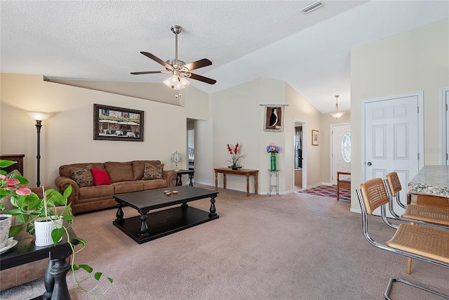 18 Royal Palm Ln, Palm Coast, FL 32164 - carpeted living room with a ceiling fan, vaulted ceiling, and baseboards