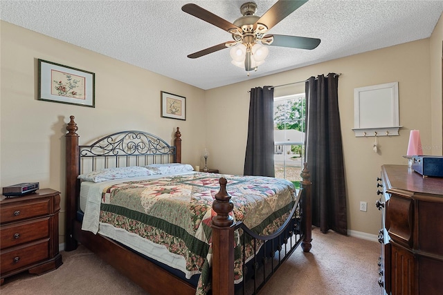 18 Royal Palm Ln, Palm Coast, FL 32164 - bedroom featuring carpet floors, a textured ceiling, ceiling fan, and baseboards