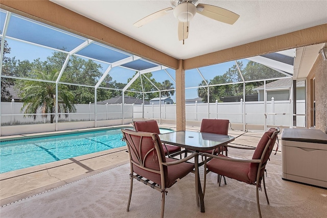 18 Royal Palm Ln, Palm Coast, FL 32164 - view of swimming pool featuring a fenced backyard, a patio area, a lanai, and a ceiling fan