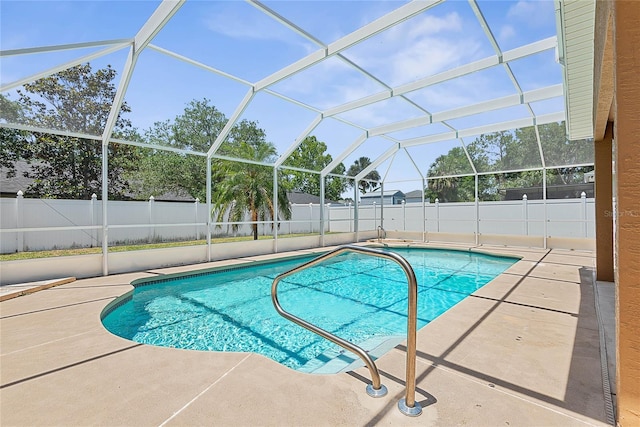 18 Royal Palm Ln, Palm Coast, FL 32164 - view of swimming pool featuring a fenced backyard, a patio area, and a lanai