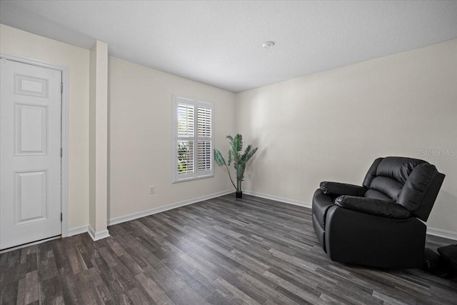 6 Ryding Ln, Palm Coast, FL 32164 - sitting room featuring wood finished floors and baseboards