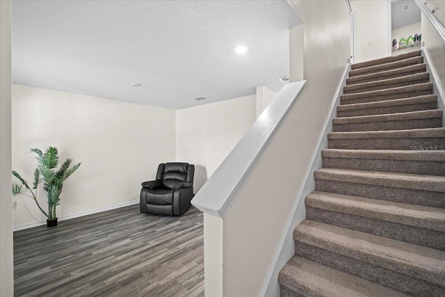 6 Ryding Ln, Palm Coast, FL 32164 - stairs with wood finished floors, baseboards, and recessed lighting