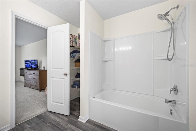 6 Ryding Ln, Palm Coast, FL 32164 - bathroom featuring wood finished floors and washtub / shower combination
