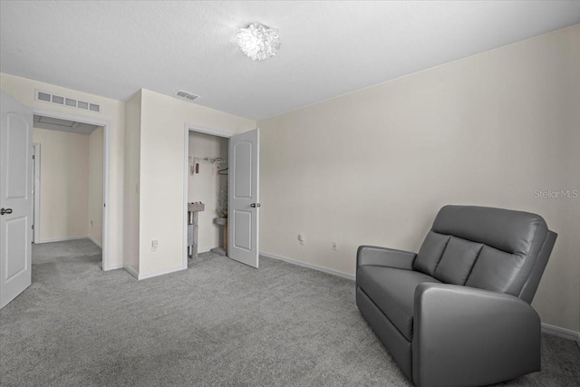 6 Ryding Ln, Palm Coast, FL 32164 - living area featuring baseboards and light carpet