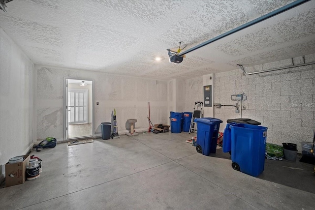 6 Ryding Ln, Palm Coast, FL 32164 - garage featuring a garage door opener and electric panel