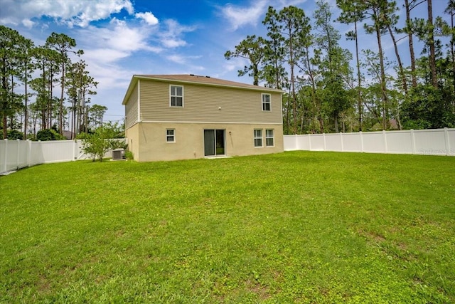 6 Ryding Ln, Palm Coast, FL 32164 - back of house with stucco siding and central air condition unit