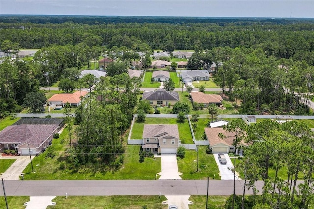6 Ryding Ln, Palm Coast, FL 32164 - aerial perspective of suburban area featuring a forest