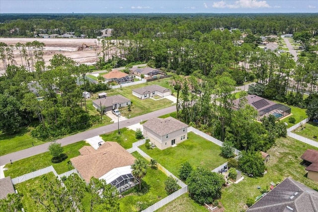 6 Ryding Ln, Palm Coast, FL 32164 - aerial overview of property's location featuring a heavily wooded area and nearby suburban area