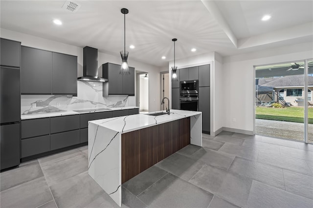 11 Ethan Allen Dr, Palm Coast, FL 32164 - kitchen with wall chimney exhaust hood, modern cabinets, gray cabinetry, and recessed lighting