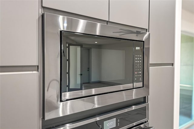 11 Ethan Allen Dr, Palm Coast, FL 32164 - kitchen view of stainless steel microwave and oven